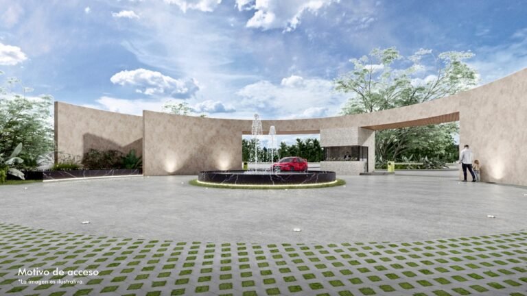 entrada a residencial con fuente en medio y casete de vigilancia