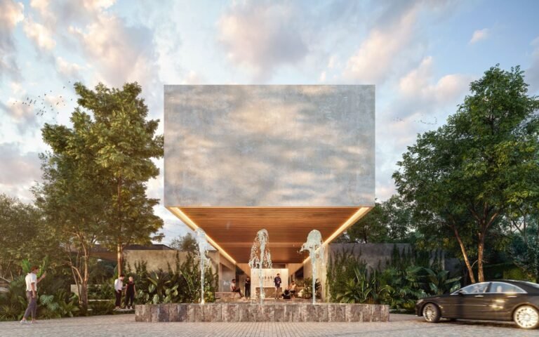 entrada a residencial con fuentes al frente